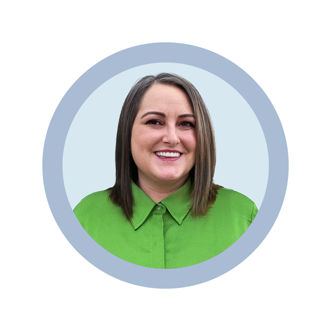 Lisa Johnson headshot against light blue background