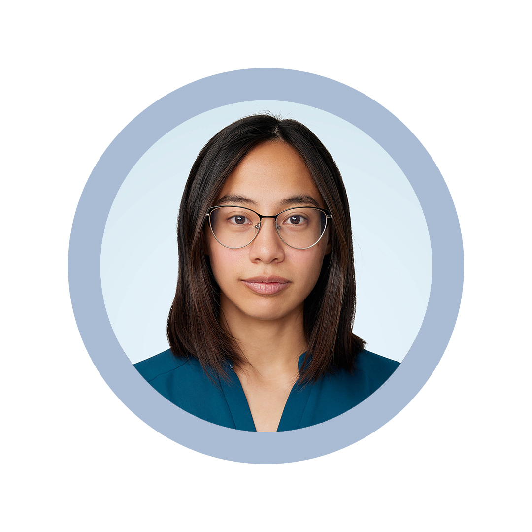 Vanessa Peck headshot against light blue background